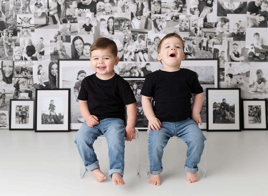 Twin boys on custom photo backdrop