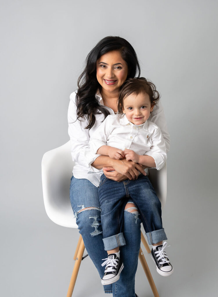 Mom with son on chair during motherhood session